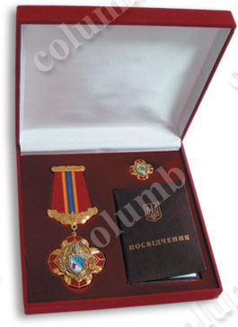 Square case with a flocked lodgment for a badge, a miniature of a badge and certificate