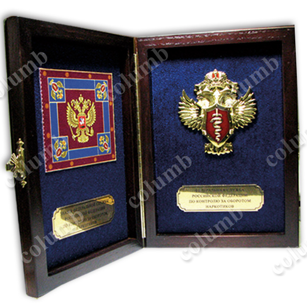 A set of symbols of the Federal Drug Control Service of the Russian Federation in a wooden case (flag + coat of arms)